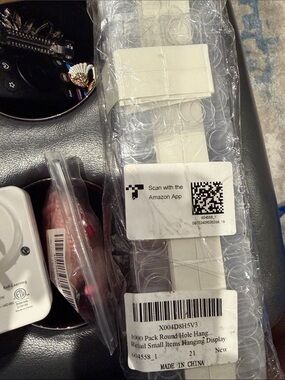 1000 Small Round Hole Hanging Display Strips in White - Pack